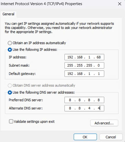 Chọn mục Obtain an IP address automatically